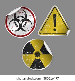 Vector collection of three realistic grunge stickers consists of "Biohazard", "Warning" and "Radioactive contamination" signs. Fully editable isolated set for your projects. Eps 10 file.