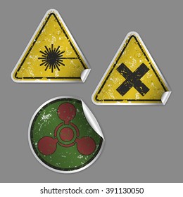 Vector collection of three realistic grunge stickers consists of "Laser Hazard", "Harmful" and "Chemical Weapon" signs. Fully editable isolated set for your projects. Eps 10 file.