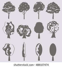 Vector collection of tree silhouettes isolates. Set of abstract stylized trees.