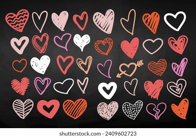 Vector color chalk drawn collection of Valentine hearts on chalkboard background