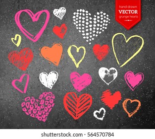 Vector color chalk drawn collection of grunge Valentine hearts on gray asphalt texture background.