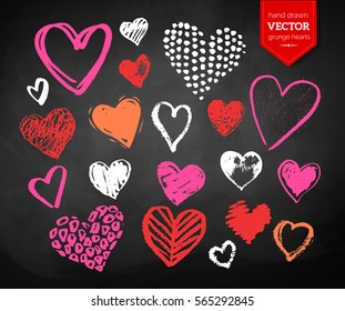 Vector color chalk drawn collection of grunge Valentine hearts on blackboard background.