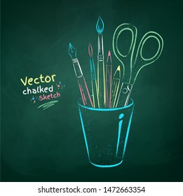 Vector color chalk drawn  illustration of art tools in holder on green chalkboard background.