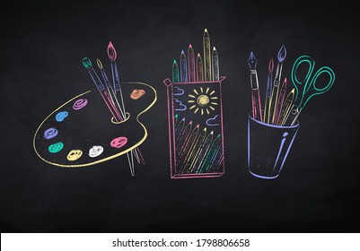 Vector color chalk drawn illustration set of artists supplies on chalkboard background.