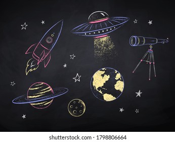 Vector color chalk drawn illustration collection of space objects on black chalkboard background.