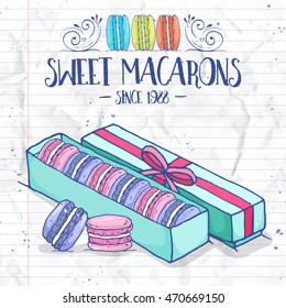 Vector color macarons in a box on a notebook page