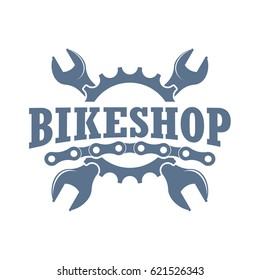 Vector color vintage badge for a bikeshop and store of bikecycling parts and accesories