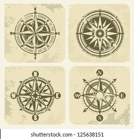 vector color vintage compasses with grunge on background
