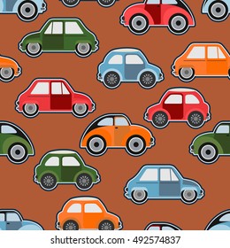 Vector colored cars. Seamless background. Wallpaper in the nursery.