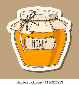 Vector colored hand drawn illustration with paper lid honey jar sticker cut out. Vintage style, retro brown background. 