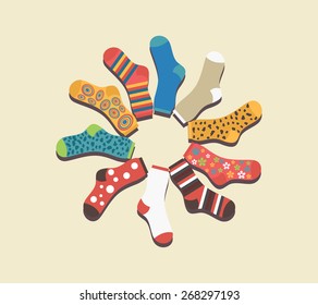 Vector colored socks in a circle on a beige background