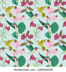 Vector colorful hummingbirds seamless pattern on blue background with pink tropical flowers. Ideal for fabric, textiles, wallpaper and print on demand products.