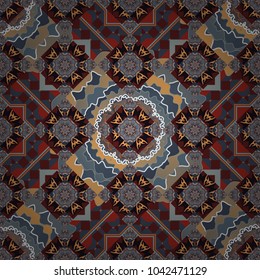 Vector colorful kaleidoscopic seamless pattern for textile, ceramic tiles, wallpapers and fabric. Traditional ethnic background in gray, brown and blue colors.