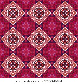 Vector colorful kaleidoscopic seamless pattern for textile, ceramic tiles, wallpapers and fabric. Traditional ethnic background in red, pink and white colors.