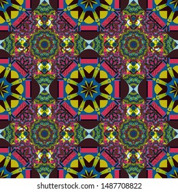 Vector colorful kaleidoscopic seamless pattern for textile, ceramic tiles, wallpapers and fabric. Traditional ethnic background in brown, magenta and blue colors.