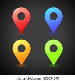 Vector colorful map markers. 3D illustration on black background.