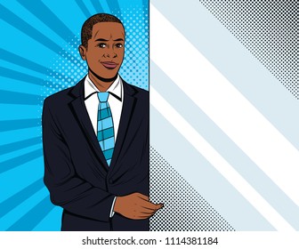 Vector colorful pop art style illustration of a businessman holding a white banner. Handsome african american guy in suit showing to advertisement place