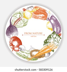 Vector colorful round frame with sketch of vegetables. Card, badge or plate design with hand drawn organic food illustration.