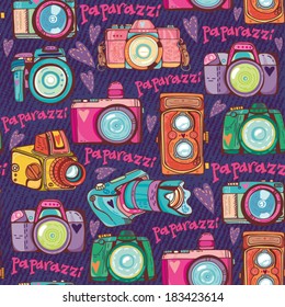 Vector colorful seamless pattern with cute retro cameras.