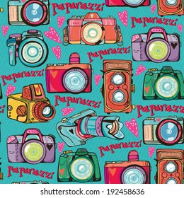 Vector colorful seamless pattern with cute retro cameras.