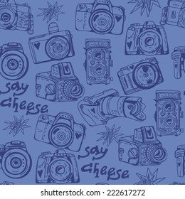 Vector colorful seamless pattern with cute retro cameras.