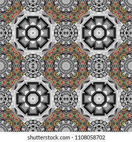 Vector colorful symmetrical seamless pattern for textile, tiles and design in black, green and gray tones.