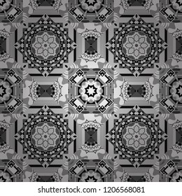 Vector colorful symmetrical seamless pattern for textile, tiles and design in white, gray and black tones.