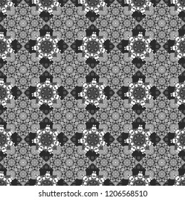 Vector colorful symmetrical seamless pattern for textile, tiles and design in black, white and gray tones.