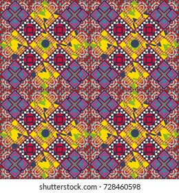 Vector colorful symmetrical seamless pattern for textile, tiles and design in violet, red and blue tones.
