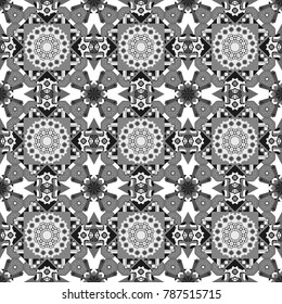 Vector colorful symmetrical seamless pattern for textile, tiles and design in gray, black and white tones.