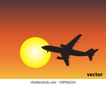 Vector concept or conceptual black plane,airplane aircraft silhouette flying over sky at sunset,sunrise background,metaphor to air,travel,transportation,jet,flight,transport,business,vacation,tourism