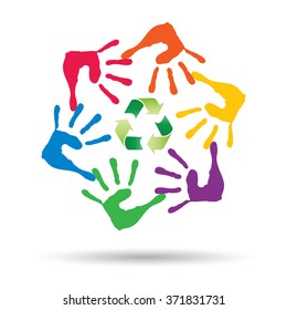 Vector concept or conceptual circle or spiral of colorful hand prints made by children with a green recycle symbol isolated on white background, for ecology, education, environment, eco, global nature