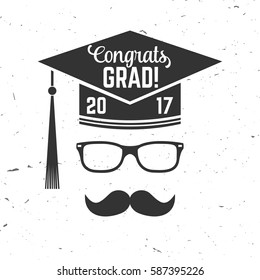 Vector congratulations graduates Class of 2017 badge. Concept for shirt, print, seal, overlay or stamp, greeting, invitation card. Typography design. Graduation design with hut and text Congrats Grad.