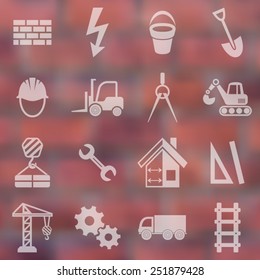 Vector construction icons on brick wall blurred background