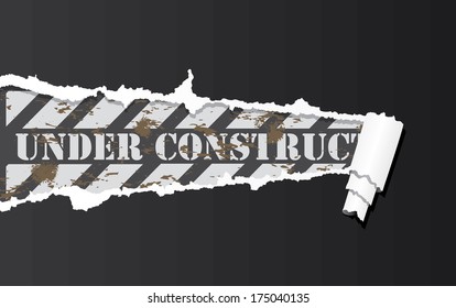 Vector construction sign under ripped paper.