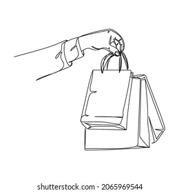 Vector continuous one single line drawing icon of hand holding shopping bags with christmas shopping or black friday in silhouette on a white background. Linear stylized.