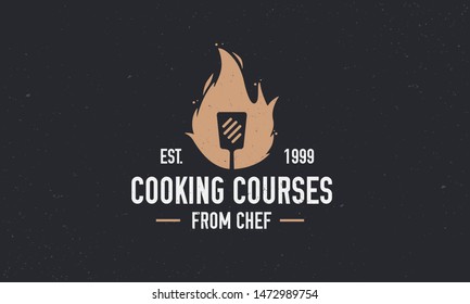 Vector cooking logo with spatula and fire flame. Label, badge for food studio, cooking courses, culinary school. Vector illustration