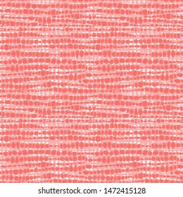 Vector coral pink seamless fabric texture. Canvas for embroidery. Suitable for textile, gift wrap and wallpaper.