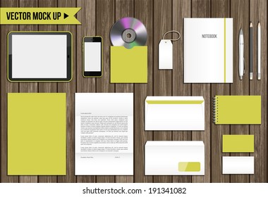 Vector corporate identity mock up. Consist of tablet pc, smart phone, CD envelope, tag, notebook, folder, paper A4, letter, business cards, spiral notepad, pen, pencil.