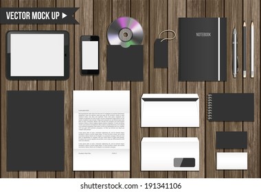 Vector corporate identity mock up. Consist of tablet pc, smart phone, CD envelope, tag, notebook, folder, paper A4, letter, business cards, spiral notepad, pen, pencil.