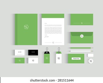 Vector corporate identity mock up. Green and black and white colors with abstract symbol