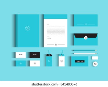 Vector corporate identity mock up. Light blue and white colors with abstract symbol.