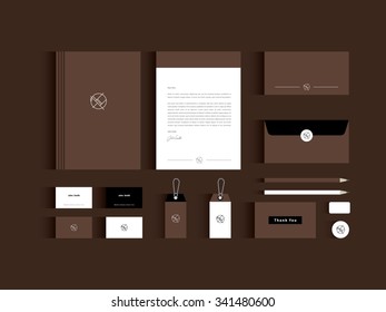 Vector corporate identity mock up. Brown and white colors with abstract symbol.