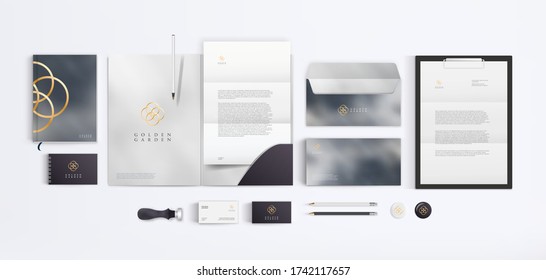Vector corporate identity style design template for branding company and stationery mockup. Golden logo and stone texture on light background.