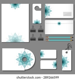 Vector corporate identity template of blank, label, business card, cd box, envelope, clips and pencils with blue abstract flower