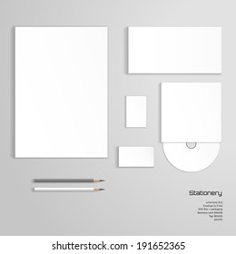 Vector corporate identity templates. Letterhead, envelope, business card, tag, disc with packaging, pencils. Realistic shadows.