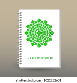 vector cover of diary or notebook with ring spiral binder - format A5 - layout brochure concept - green cloverleaves mandala on white background