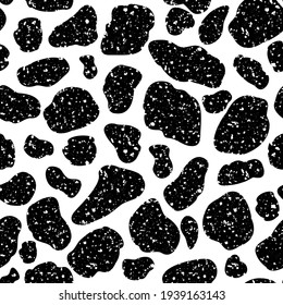 Vector cow hide pattern seamless background. Black irregular patches on white backdrop. Abstract cows skin grunge textured design. Random cattle spots repeat. Farm animal textural all over print