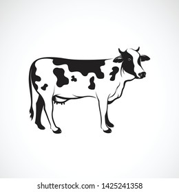 Vector of cow on white background, Farm animal, Vector illustration. Cow logo or icon. Easy editable layered vector illustration.