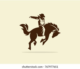 Vector of Cowboy riding wild horse